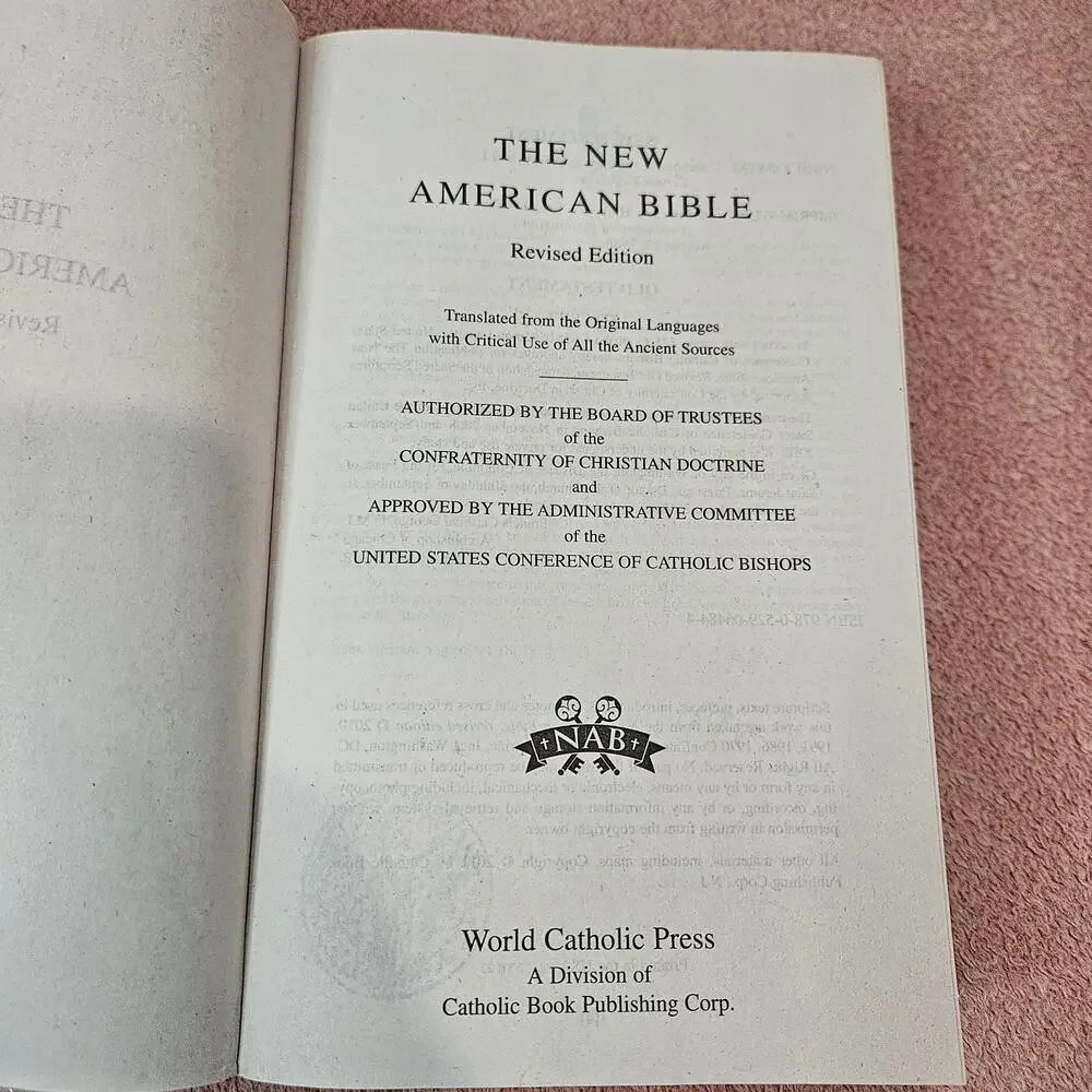 The New American Bible Revised Edition World Catholic Press w/ protective cover